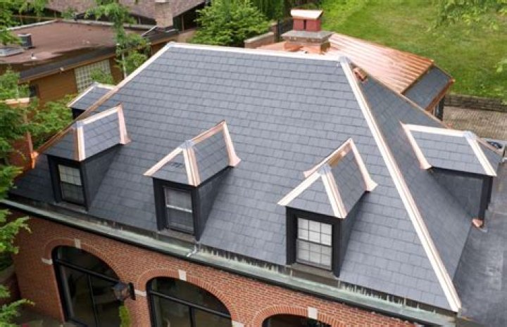 Is it safe to stand on slate roof?